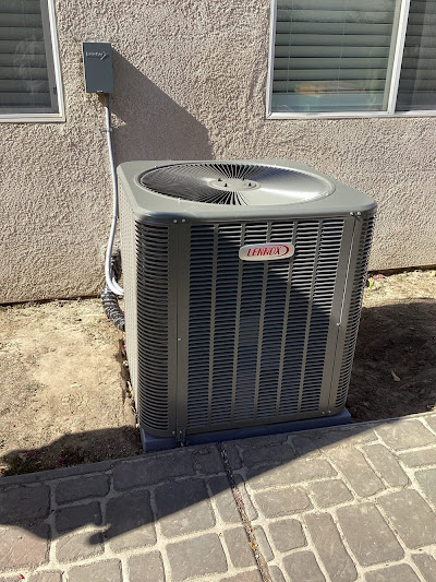 A HVAC unit positioned outside a house