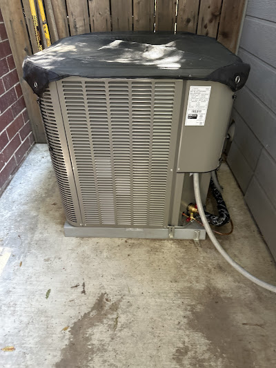 An outdoor AC unit equipped with a protective cover