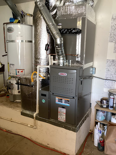 A home interior featuring a furnace and water heater