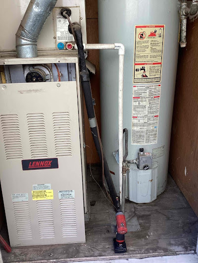 Gas furnace and water heater installed in a small room